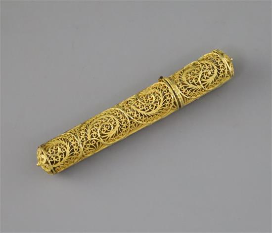 A late 18th century gilt filigree work needle or bodkin case, 4in., in original fish skin case